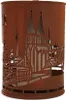 A close-up of a decorative metal lantern with a cut-out skyline design. Produktbild-Vorschau