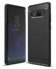 A black phone case is shown next to a smartphone. Produktbild-Vorschau