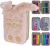 A collage of images showing a fluffy pink bunny-shaped pencil case and its contents, including colored pencils, markers, scissors, and a ruler. Náhled obrázku produktu
