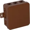 A brown electrical junction box with multiple entry points and a mounting bracket. Náhled obrázku produktu