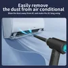 A device is being used to blow dust out of an air conditioner. Náhled obrázku produktu