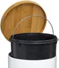 A close-up view of a trash can with a bamboo lid. Anteprima dell’immagine prodotto