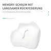 A close-up of a white memory foam cushion with a cut-out section, against a white background. Text describes the material properties. Produktbild-Vorschau