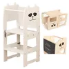 A white wooden learning tower with a cat face design, shown from multiple angles including a close-up of the chalkboard side. Anteprima dell’immagine prodotto