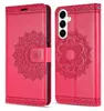 A red flip case for a smartphone, shown open and closed, with a mandala pattern embossed on the cover. Produktbild-Vorschau