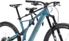 A close-up view of a bicycle with a child seat attached. Produktbild-Vorschau
