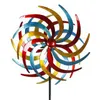 A colorful metal wind spinner on a black pole against a white background. Produktbild-Vorschau