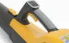Close-up view of the handle and control panel of a yellow and black leaf blower. Produktbild-Vorschau