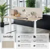 A modern office desk setup with a height-adjustable desk and a fabric partition. Náhled obrázku produktu