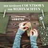 Hands wrapping a gift with decorative paper bags and clothespins on a wooden table. Anteprima dell’immagine prodotto