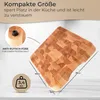 A wooden cutting board with dimensions and weight indicated, along with text describing its features. Produktbild-Vorschau