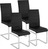 Four black dining chairs with chrome cantilever legs. Náhled obrázku produktu