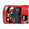 Close-up view of the internal components of a red generator. Produktbild-Vorschau