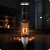 A close-up marketing image of a black and silver hand blender, with internal components illuminated in orange and surrounded by glowing orange rings and sparks. Náhľad obrázku produktu