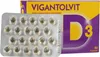 A blister pack of vitamin D3 capsules next to its product box. Podgląd zdjęcia produktu