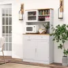 A white kitchen hutch with a microwave and storage cabinets. Podgląd zdjęcia produktu