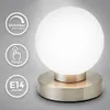 A close-up studio shot of a modern table lamp with a frosted glass globe and a brushed metal base. Produktbild-Vorschau
