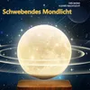 A levitating moon lamp is shown against a starry night sky background, with text overlay. Produktbild-Vorschau