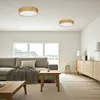 A modern living room with a sofa, coffee table, and a sideboard. Produktbild-Vorschau