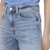 Close-up of the top part of light blue denim jeans and a blue top. Produktbild-Vorschau