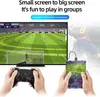 A person is playing a video game on a large screen using a controller, while also holding a handheld gaming device. Produktbild-Vorschau