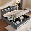 A modern upholstered bed with storage, featuring integrated LED lighting and USB ports in the headboard. Produktbild-Vorschau