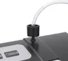 A close-up view of a vacuum sealer's accessory port with a clear tube attached. Podgląd zdjęcia produktu