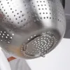 Close-up view of the bottom of a metal colander. Náhľad obrázku produktu