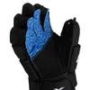 A close-up view of a black hockey glove with blue lining. Náhľad obrázku produktu