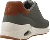 A side view of a gray Skechers sneaker with brown accents and a white sole. Voir les images du produit