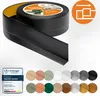 A roll of black flexible skirting board with adhesive backing, displayed with a selection of color swatches and a certification badge. Anteprima dell’immagine prodotto