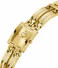 A close-up, angled shot of a gold-colored Guess watch with crystal embellishments on the bracelet. Náhled obrázku produktu