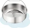 A stainless steel steamer basket with a handle, resting on a light blue cloud-like background. Podgląd zdjęcia produktu