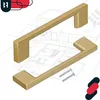 Two gold cabinet handles are shown on top of architectural blueprints. Produktbild-Vorschau