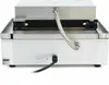 The back of a silver sandwich maker is shown, with a coiled metal cord extending from the top and connecting to a black power cord at the bottom. Produktbild-Vorschau