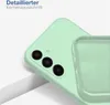 Close-up of a light green smartphone case, showing the camera cutout and the interior texture. Produktbild-Vorschau