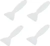 Four white plastic ice scrapers are arranged in a grid on a white background. Produktbild-Vorschau