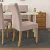 A dining room setting with chairs around a table. Náhľad obrázku produktu