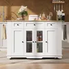 A white kitchen island with a wooden countertop is shown in a kitchen setting. Various items are displayed on the countertop and inside the island's glass cabinets. Anteprima dell’immagine prodotto