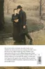 A couple walking in a park on a rainy day. Produktbild-Vorschau