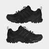 Two black Adidas Terrex hiking shoes are shown against a light gray background. Anteprima dell’immagine prodotto