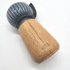 A close-up, angled view of a Kähler Hammershøi Mühle Anthrazit pepper mill against a white background. Podgląd zdjęcia produktu