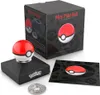 A Pokémon Mini Poké Ball electronic replica is displayed with its packaging and accessories. Náhľad obrázku produktu