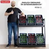 A man is giving a thumbs up next to a shelving unit filled with crates of drinks. Produktbild-Vorschau