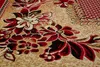 A close-up view of a patterned rug with floral designs. Náhled obrázku produktu