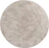 A circular rug with a textured, plush surface. Produktbild-Vorschau