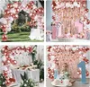 Vier Bilder in einer Collage, die Rosenquarz- und weiße Luftballonbögen für Outdoor- und Indoor-Geburtstagsfeiern zeigen, mit Babys und Desserttischen Náhled obrázku produktu