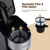 Close-up of a coffee maker's filter basket area, with text highlighting its removable feature. Produktbild-Vorschau