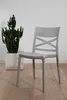 A light gray chair is placed next to a potted cactus against a white wall and wooden floor. Anteprima dell’immagine prodotto
