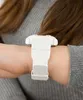 A close-up of a person's wrist wearing a white Casio G-Shock watch. Produktbild-Vorschau
